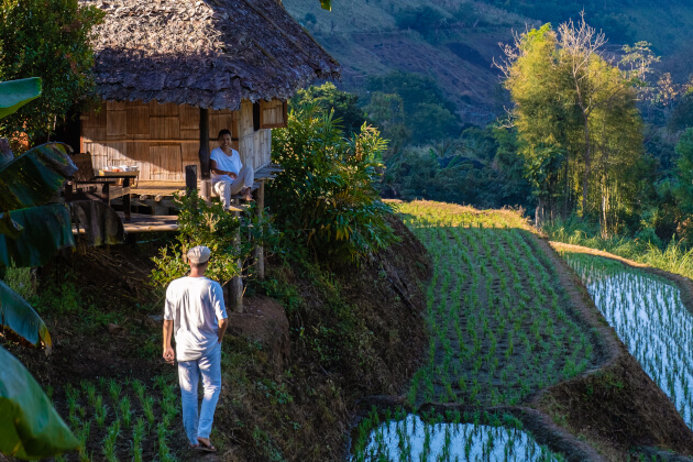 Reisterrassen und traditionelle Hütten in Nordthailand. | Gebeco