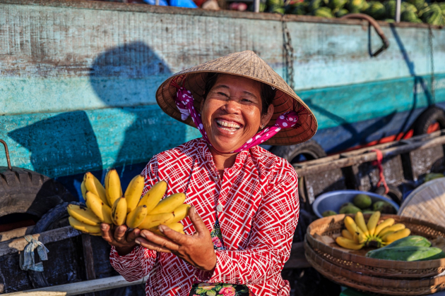 Vietnamesische Frau auf einem schwimmenden Markt | Gebeco